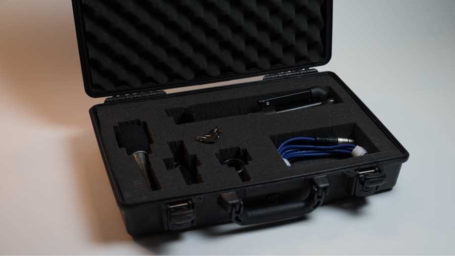 open pelican case filled with audio gear